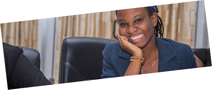 Peace Itimi smiling at the camera